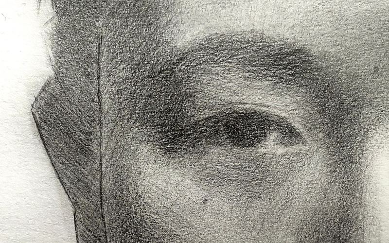Close detail of an eye in a graphite drawing